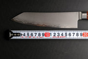 KIRINAMI Kiritsuke Bunka Knife 180mm crafted by Seki Kikusui with a ruler showing that the blade measures 18cm