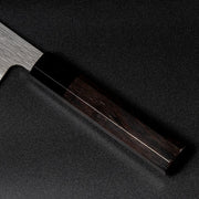 Closeup on ebony handle with buffalo horn ferrule on VG XEOS Nakiri Knife 18cm crafted by Nigara Hamono
