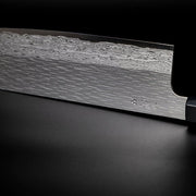 Closeup on engraving on blade of VG XEOS Nakiri Knife 18cm crafted by Nigara Hamono