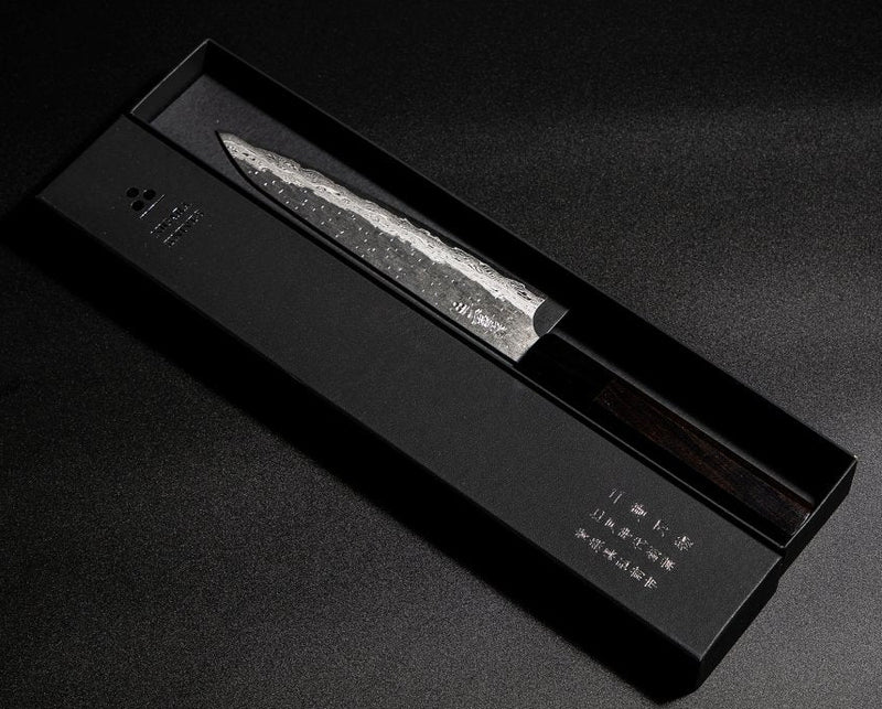 VG XEOS Petty Knife 16cm by Nigara Hamono in elegant box on black background