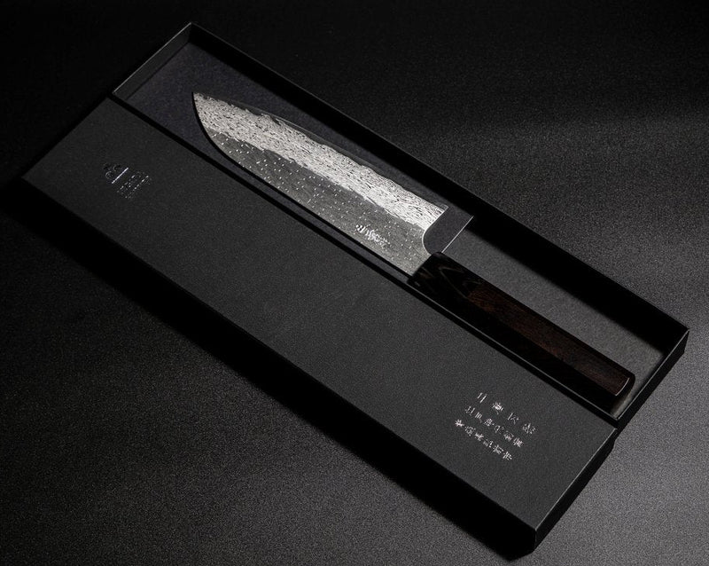 VG XEOS Santoku Knife 18.5cm crafted by Nigara Hamono in elegant box on black background