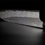 Closeup on engraving on blade of VG XEOS Santoku Knife 18.5cm crafted by Nigara Hamono 