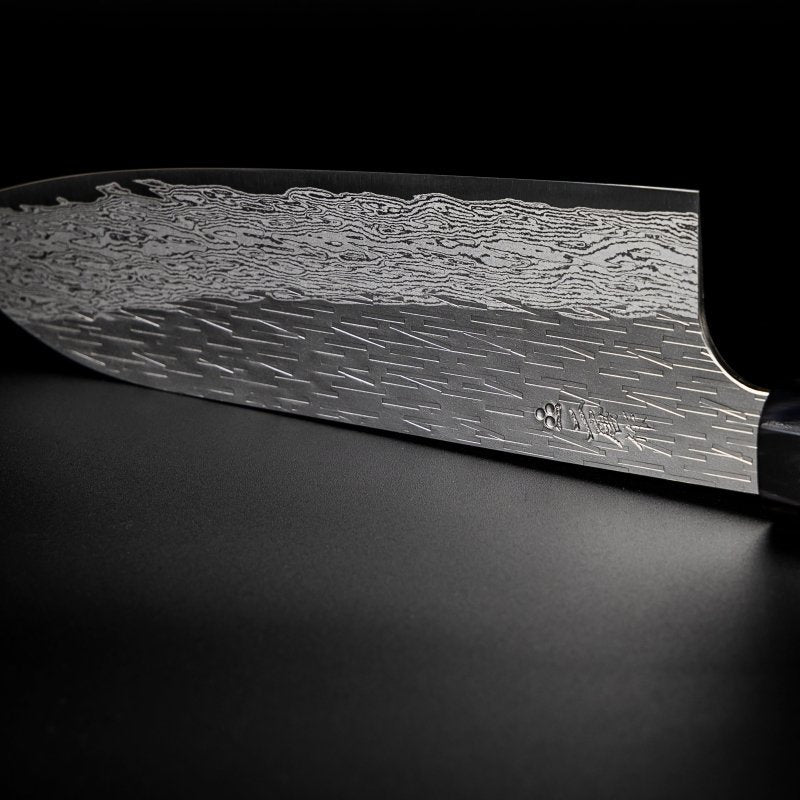 Closeup on engraving on blade of VG XEOS Santoku Knife 18.5cm crafted by Nigara Hamono 