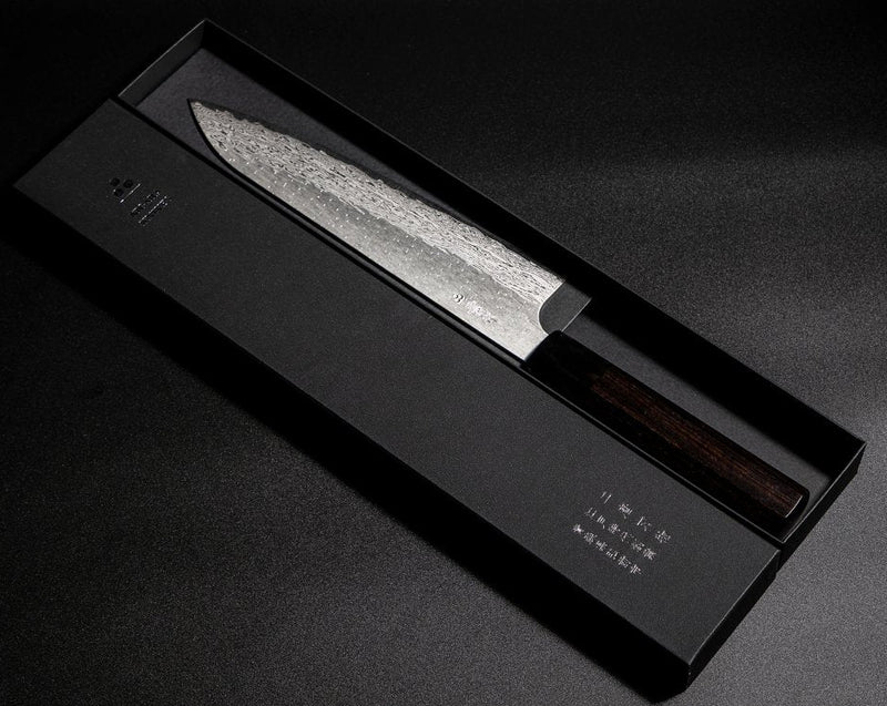 VG XEOS Gyuto Knife 22.5cm crafted by Nigara Hamono in elegant box on black background