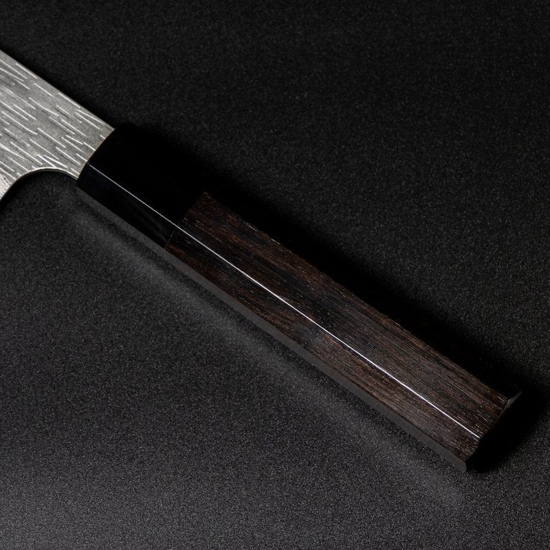 Closeup on ebony handle with buffalo horn ferrule on VG XEOS Gyuto Knife 22.5cm crafted by Nigara Hamono