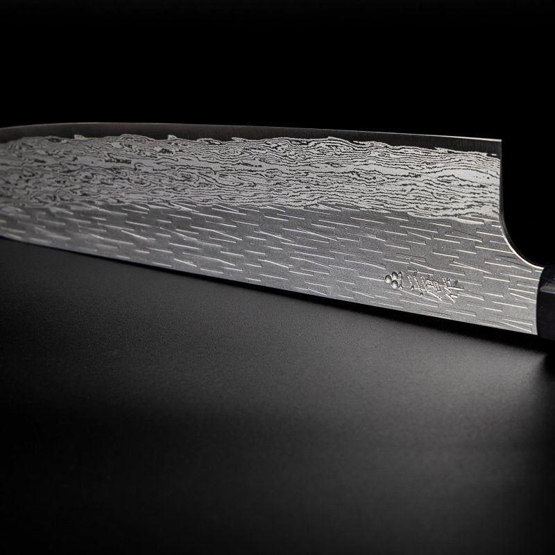 Closeup on engraving on VG XEOS Gyuto Knife 22.5cm crafted by Nigara Hamono
