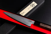 Sakai TAKAYUKI Gyuto 210mm by Aoki Hamono inside the inner red open box over the cover with a Japanese characters label