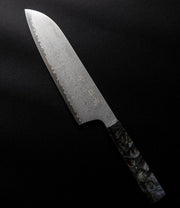 Omoi Santoku stainless steel Kitchen Knife 180mm crafted by Nenohi Cutlery arranged diagonally on black background