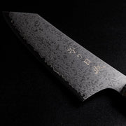 Closeup of front engraving on blade of Omoi Kiritsuke Santoku Kitchen Knife 180mm crafted by Nenohi Cutlery