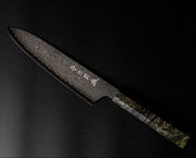 Omoi Gyuto stainless steel Kitchen Knife 180mm crafted by Nenohi Cutlery on black background
