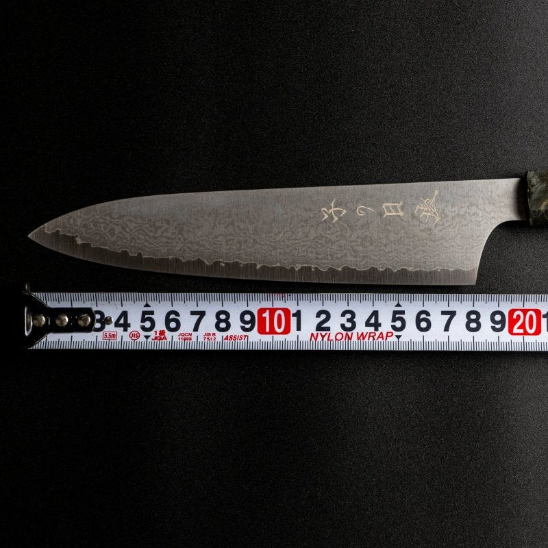 Omoi Gyuto stainless steel Kitchen Knife 180mm crafted by Nenohi Cutlery with ruler showing the blade measures 18cm