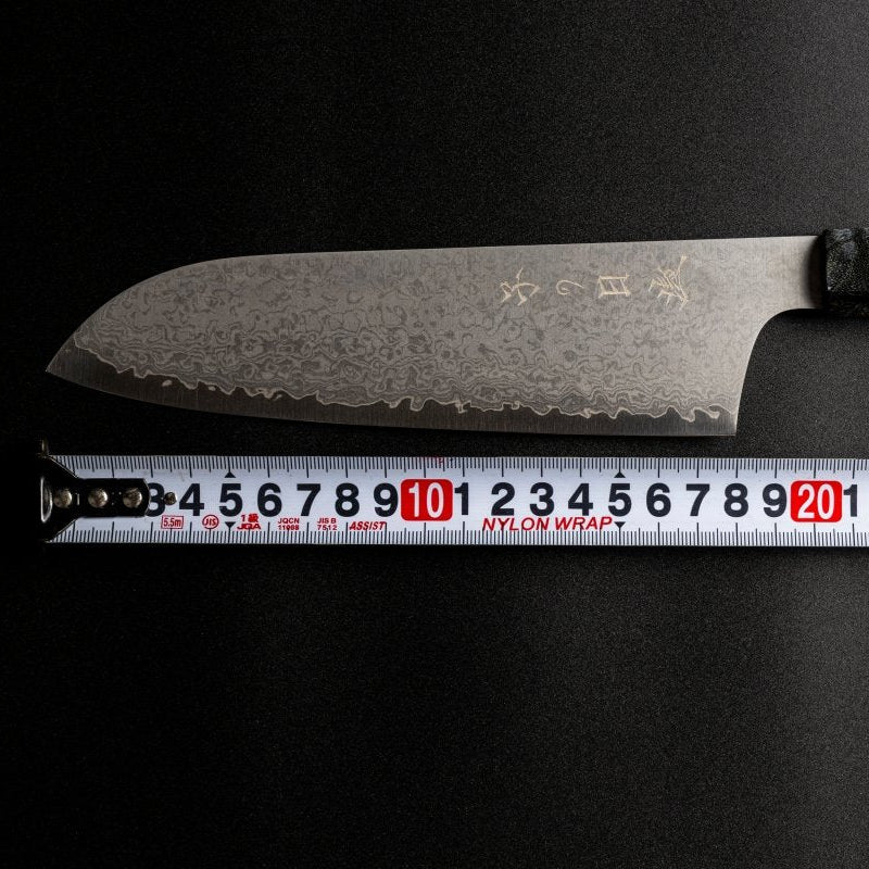 Omoi Santoku stainless steel Kitchen Knife 180mm crafted by Nenohi Cutlery with ruler showing the blade measures 18cm