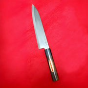 Tamahagane 21cm Gyuto Knife by Shirou Kunimitsu on red background