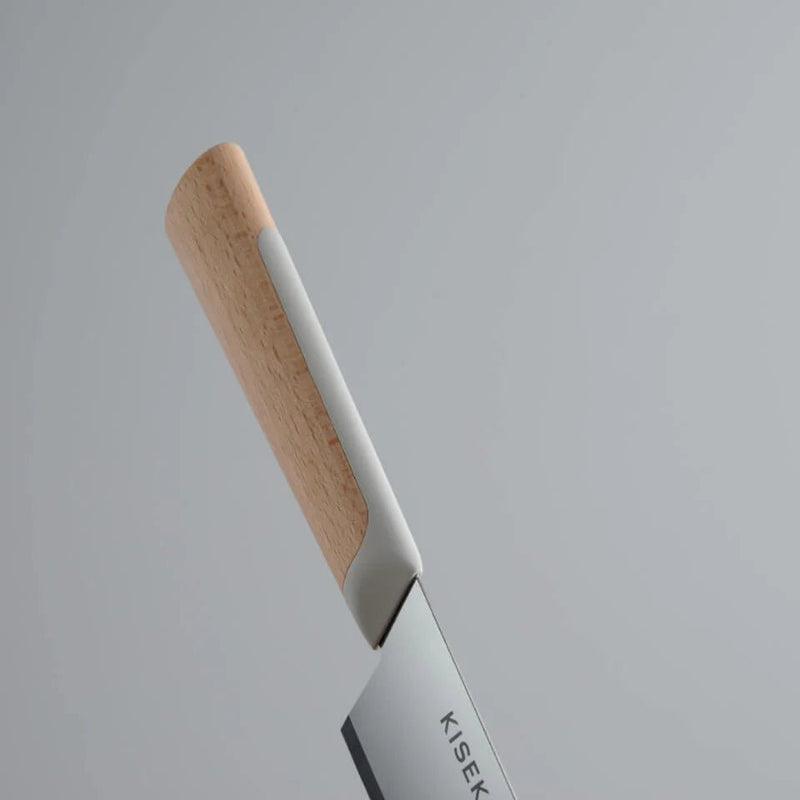 Closeup of the KISEKI Santoku Knife Beech variation handle