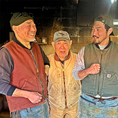 Poster of the three artisans (grandfather, father and son) running Minomo Blacksmith