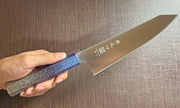 Japanese-style Kiritsuke Santoku Kitchen Knife 21cm crafted by Inoguchi Hamono in Seki, Japan with Japanese Oak handle with gradient blue urushi lacquer held in hand
