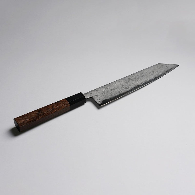 Polished Finish Damascus Blue Steel No. 2 Kiritsuke 210mm displayed diagonlly on grey background
