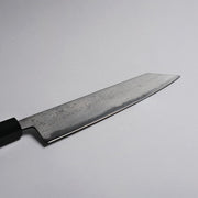 Closeup on blade of Polished Finish Damascus Blue Steel No. 2 Kiritsuke 210mm on grey background