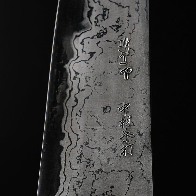 Closeup of the artisan name engraving on the blade of a Nakamura Blacksmith Aogami Super Damascus Pattern Gyuto 220mm