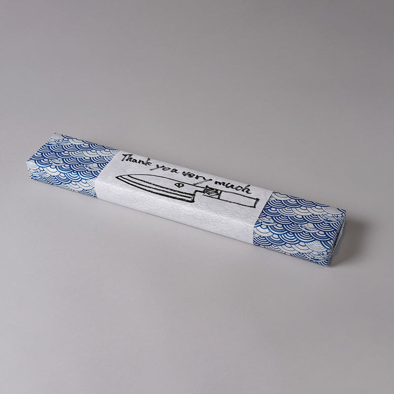 Handwritten outer packaging for Minomo Blacksmith Santoku Knife 165mm on grey background