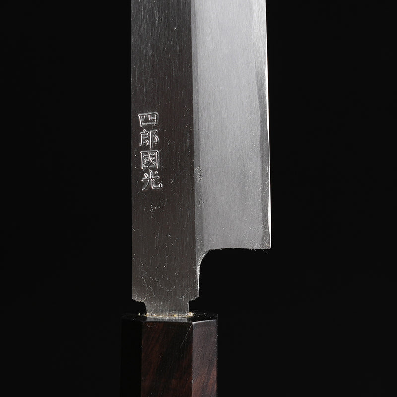 Closeup of the blade with maker's name engraving and the machi gap between blade and handle of a Shirou Kunimitsu White Steel Kasumi Sashimi Knife 230mm