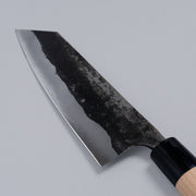 Closeup of the blade of a Nakamura Hamono Bunka Kitchen Knife 180mm with maker name engraved