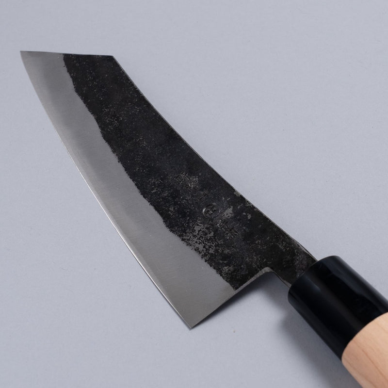 Closeup of the blade of a Nakamura Hamono Curved Back Bunka Kitchen Knife 165mm with maker name engraved