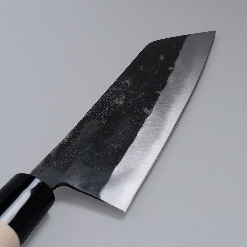 Closeup of the blade of a Nakamura Hamono Kurouchi Santoku Knife 165mm