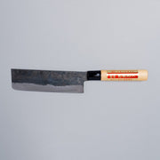 Single-Bevel Kurouchi Nakiri Knife 160mm crafted by Shirou Kunimitsu displayed horizontally on grey background
