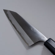 Closeup of the blade of a Nishida Hamono Polished Gyuto Knife 165mm wth maker's engraving