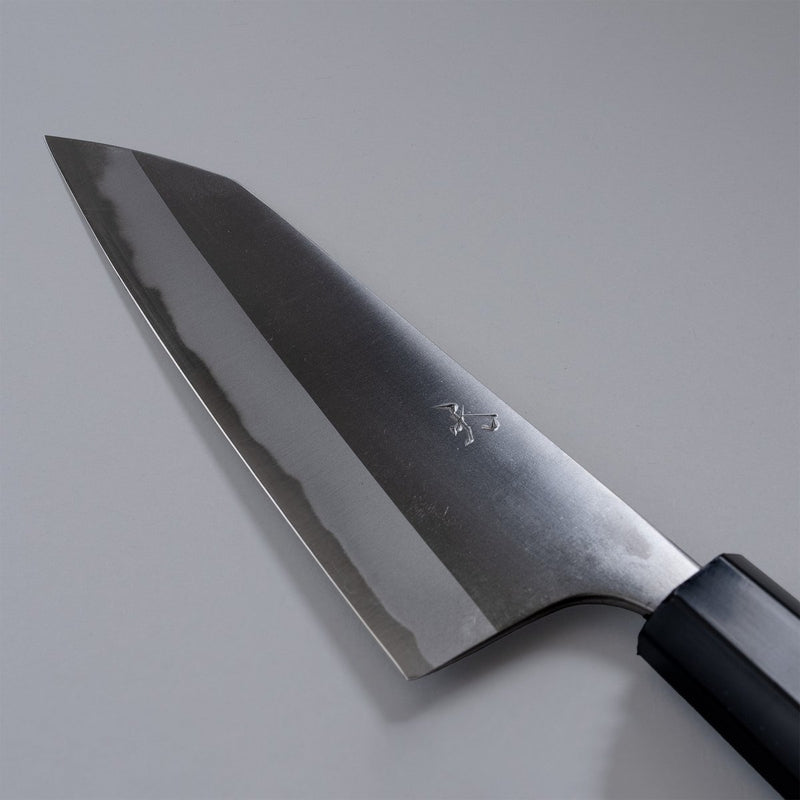 Closeup of the blade of a Nishida Hamono Polished Gyuto Knife 165mm wth maker's engraving