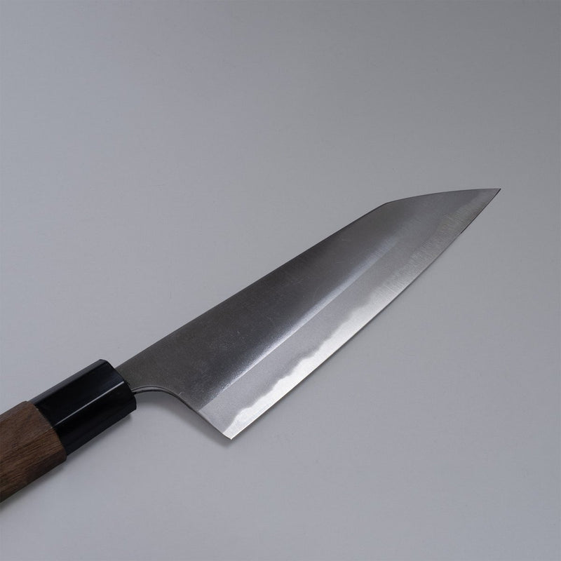 Closeup of the blade of a Nishida Hamono Polished Gyuto Knife 165mm