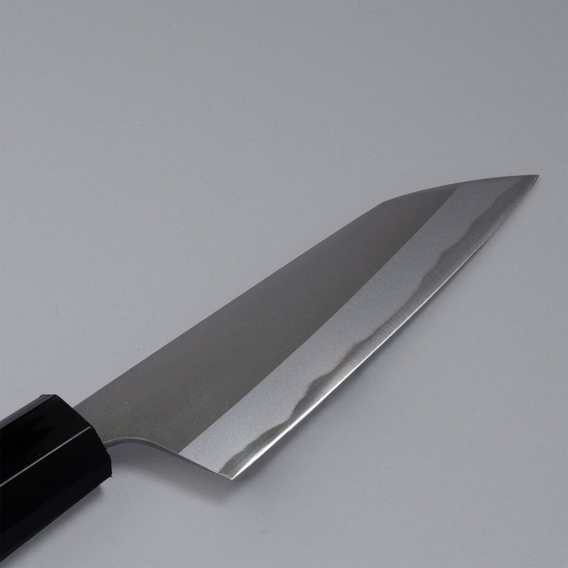 Closeup of the blade of a Nishida Hamono Polished Petty Knife 100mm