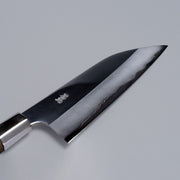 Closeup on engraving on ginsan stainless Funayuki knife 165mm crafted by Kurotori Blacksmith on grey background