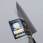 Ginsan stainless Funayuki knife 165mm crafted by Kurotori Blacksmith on grey background with certificate of authenticity