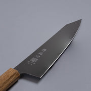 Closeup of the blade of a Inoguchi Hamono Japanese Kiritsuke Santoku Knife 210mm (Japanese Oak) with maker's engraving