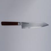 VG-10 stainless steel KIRINAMI Kiritsuke Bunka 180mm by Seki Kikusui Cutlery displayed horizontally on grey background