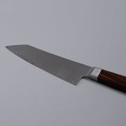 Closeup on reverse side of blade of VG-10 stainless steel KIRINAMI Kiritsuke Bunka 150mm crafted by Seki Kikusui Cutlery on grey background