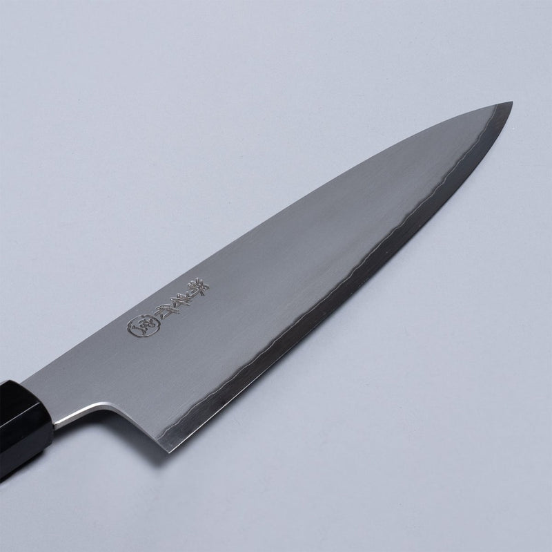 Closeup of a blade for Sakai TAKAYUKI White Steel No.2 Gyuto 210mm with maker's engraving