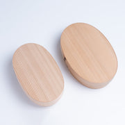 Closeup from above of closed MOCKATS Bento Box with Checked Pattern in medium and big size one next to each other