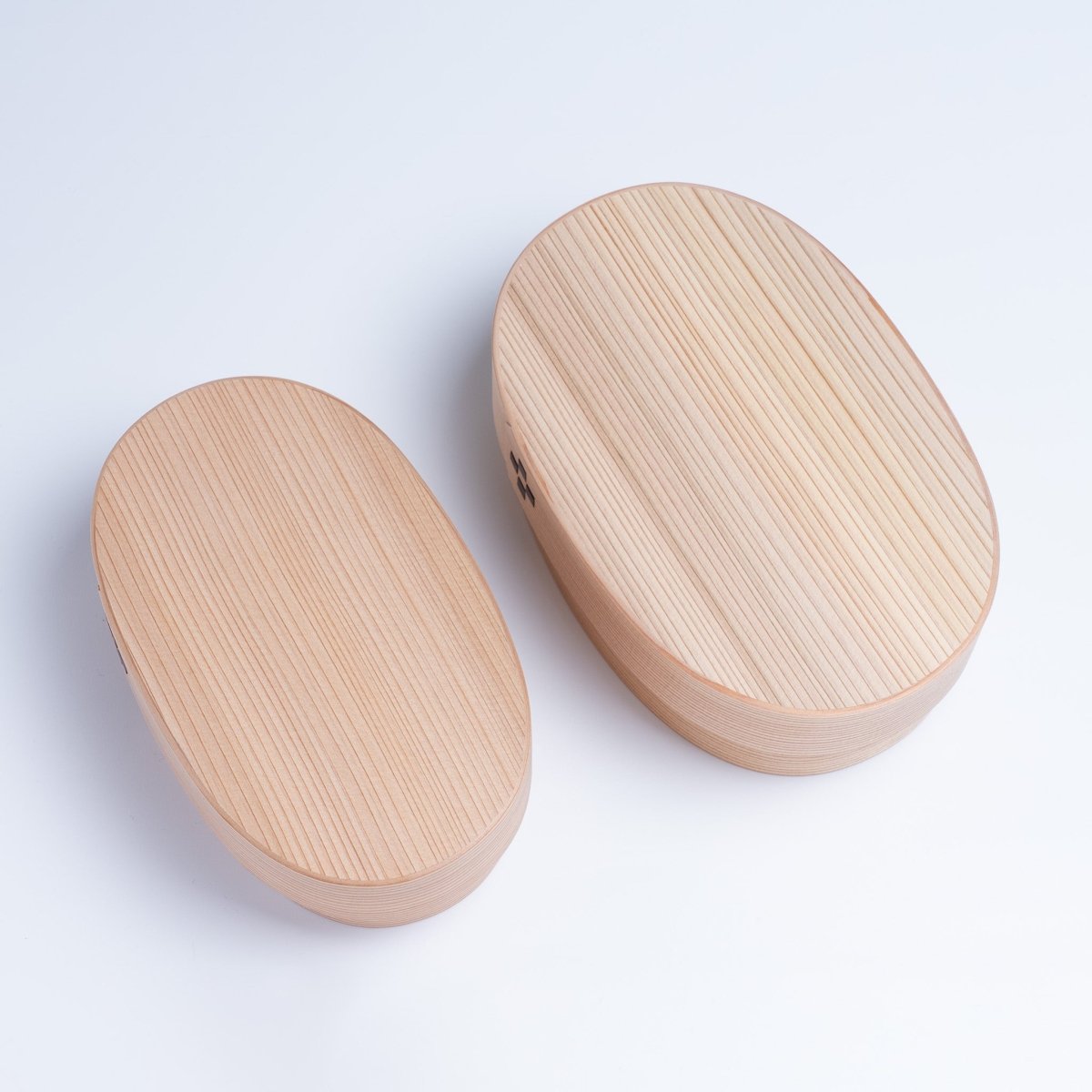 View from above of closed medium and big size MOCKATS Bento Box with Flower Pattern next to each other