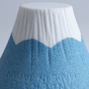 Closeup of the white and blue top for the COFIL Mount Fuji Ceramic Coffee Filter with the porous texture