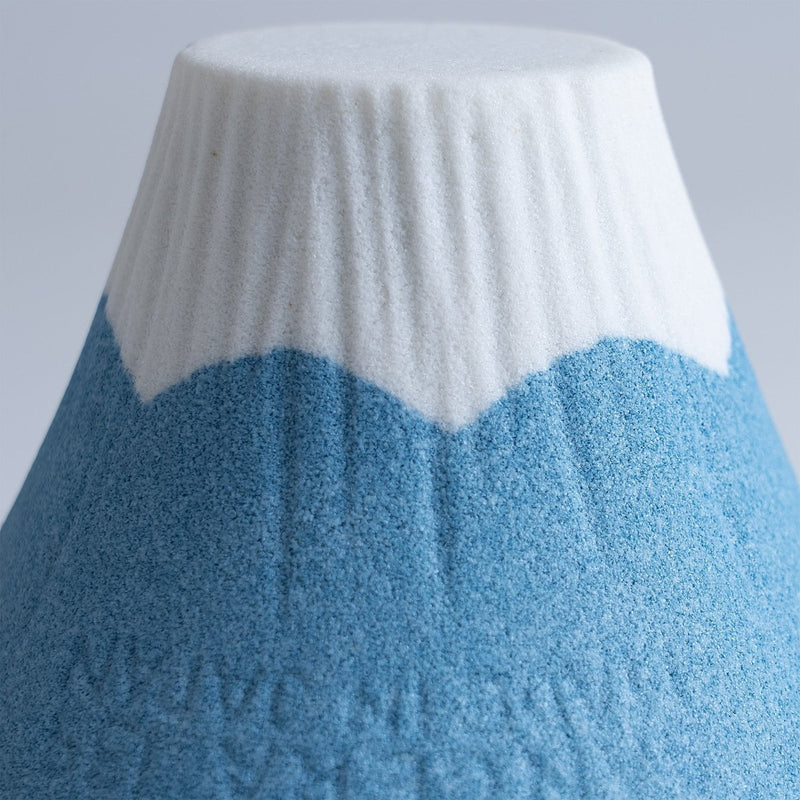 Closeup of the white and blue top for the COFIL Mount Fuji Ceramic Coffee Filter with the porous texture