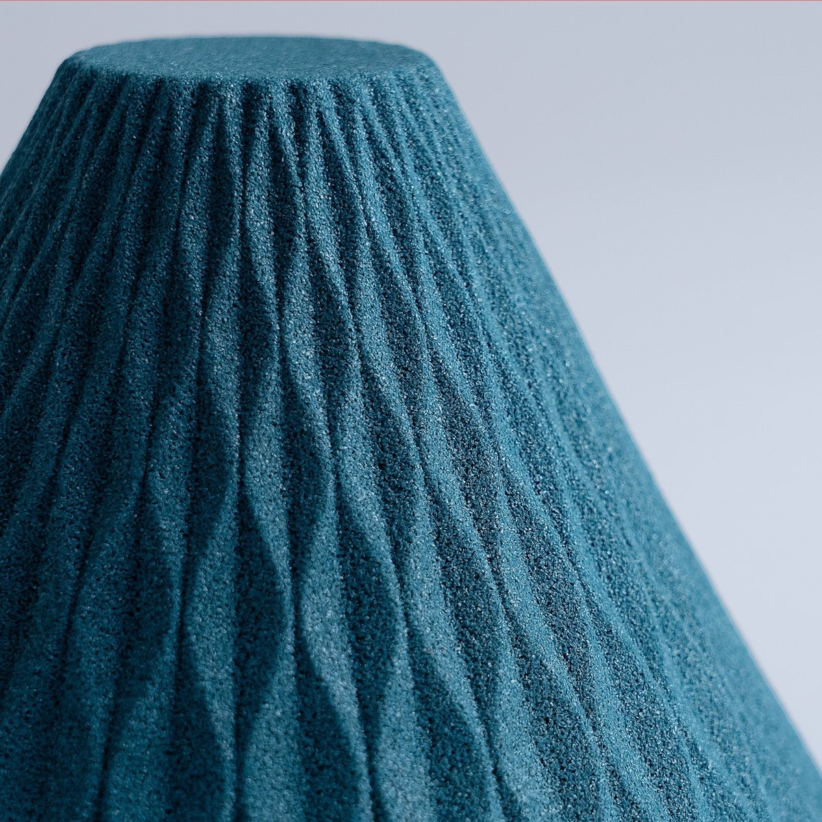 Closeup of top of COFIL Flow Ceramic Coffee Filter in blue when turned upside down