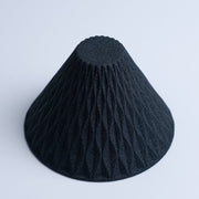 Aerial view of COFIL Flow Ceramic Coffee Filter in black turned upside down
