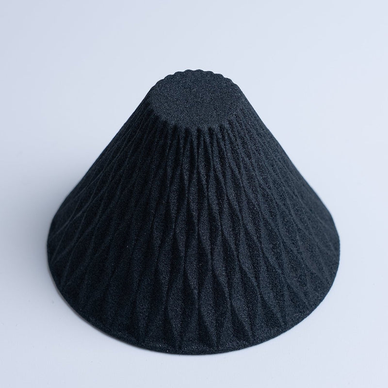 Aerial view of COFIL Flow Ceramic Coffee Filter in black turned upside down
