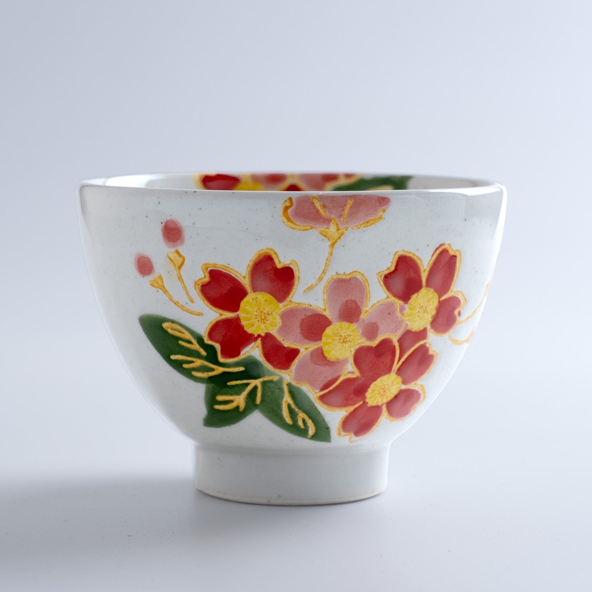 Seasonal Ceramic Bowl by Imari Togei with a Cherry Blossom pattern