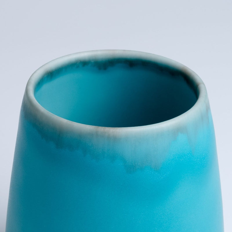 Closeup of the overture of a Turquoise Blue Round Porcelain Cup by Imari Togei