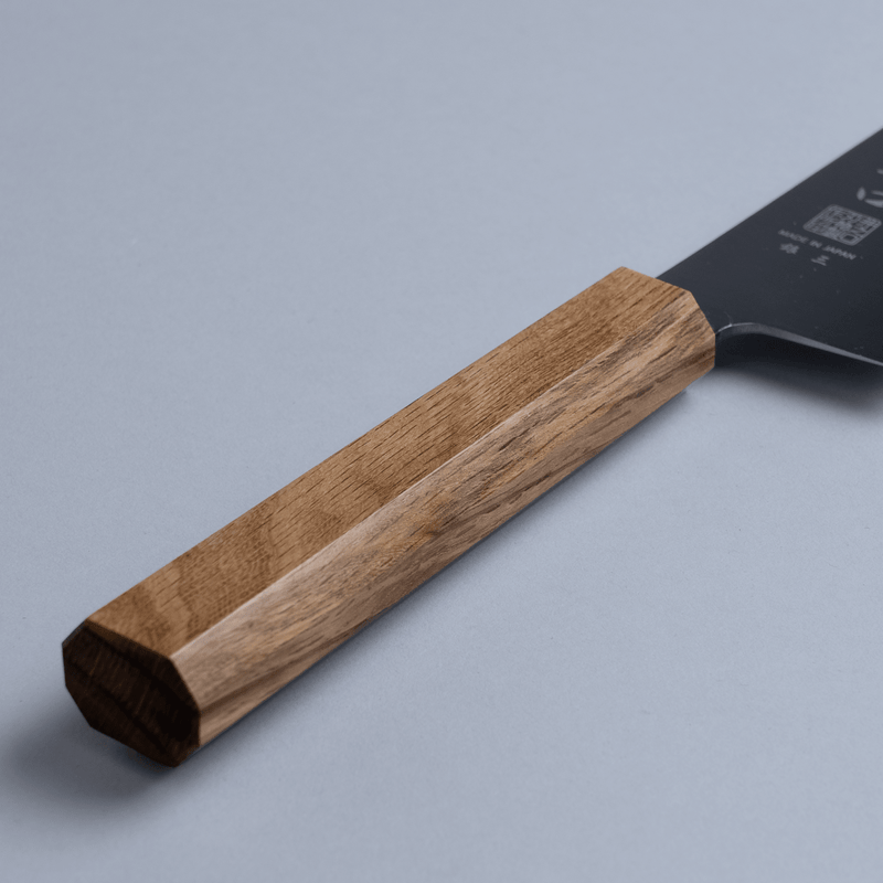 Japanese oak handle of a Inoguchi Hamono Japanese Kiritsuke Santoku Knife 210mm