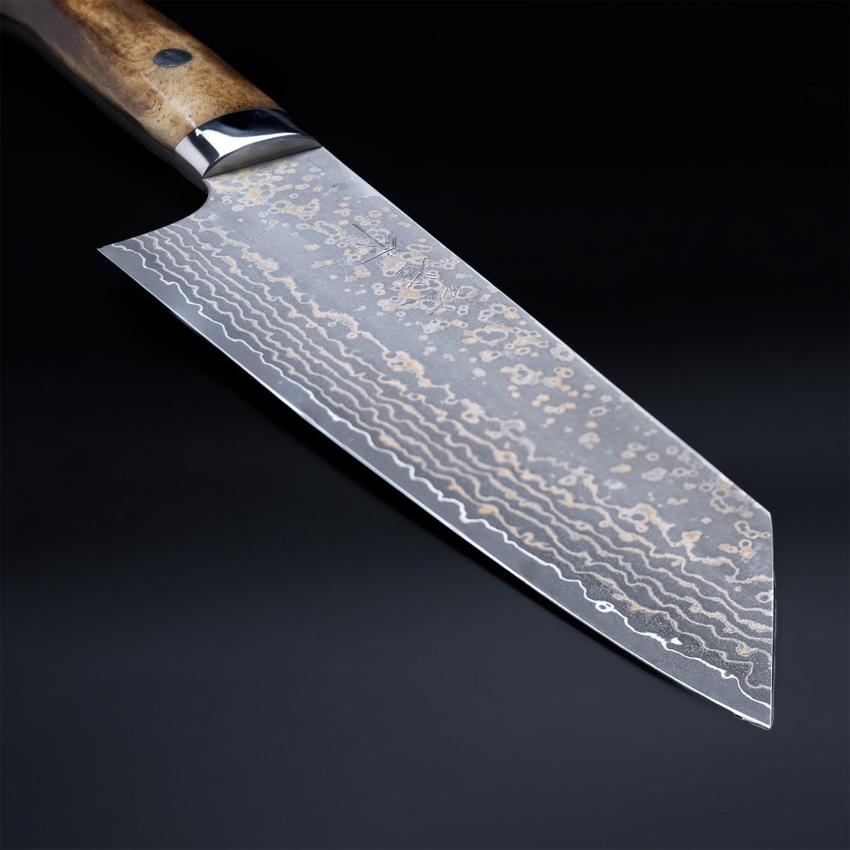 Closeup on blade of Takeshi Saji VG10W Stainless Steel Bunka Knife 180mm Gold-Toned Finish